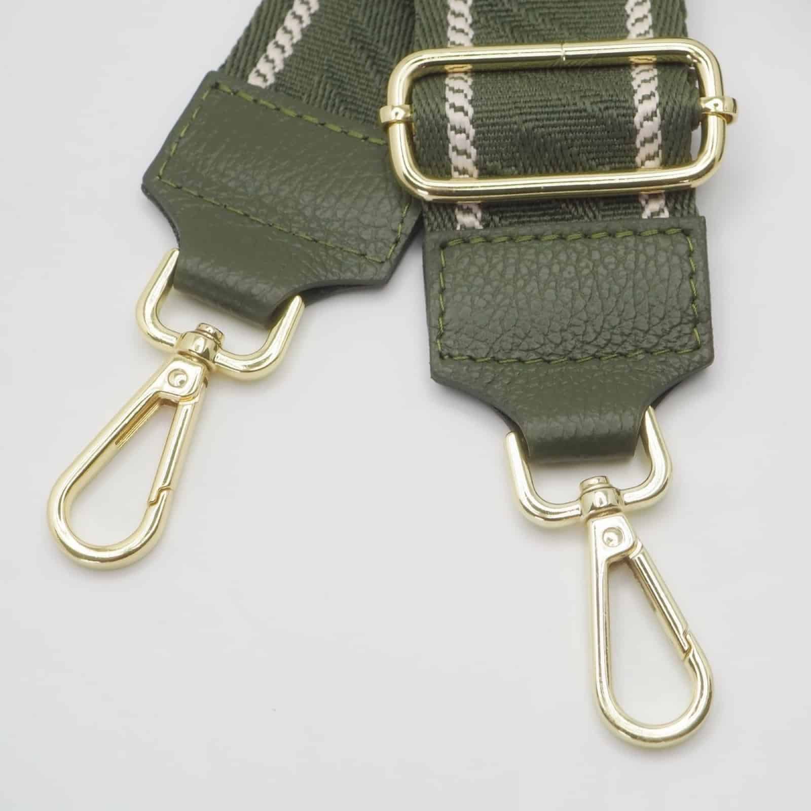 Veskestropp med houndstooth-mønster med skinndetaljer, oliven